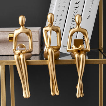 Abstract Gold Figurines